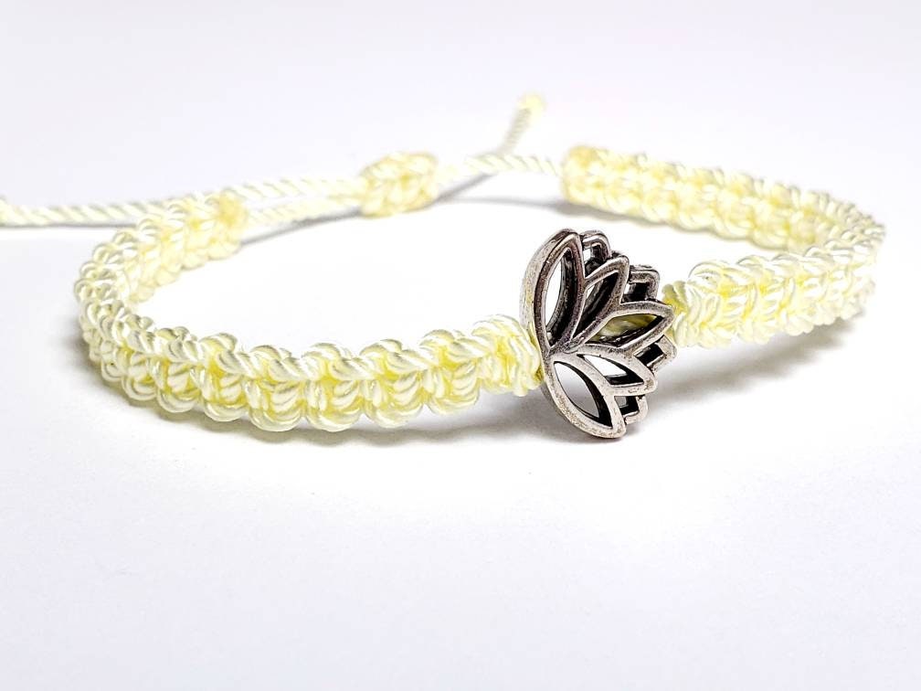 Lotus flower bracelet, soft yellow string braided bracelet, silver color lotus flower charm, new, adjustable for man & woman