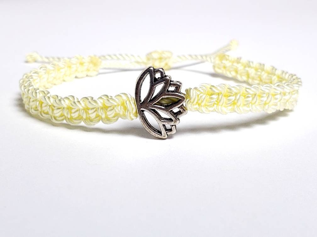Lotus flower bracelet, soft yellow string braided bracelet, silver color lotus flower charm, new, adjustable for man & woman