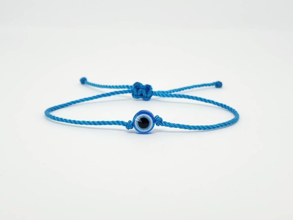 Evil eye blue string bracelet, evil eye charm, beautiful blue string wristband, evil eye protection bracelet, adjustable for man and woman