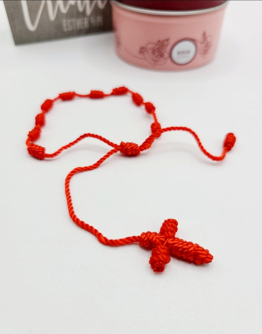 Red string cross bracelet