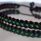 Black braided bracelet with a  green Line, adjustable wristband -new -handmade -for man & woman