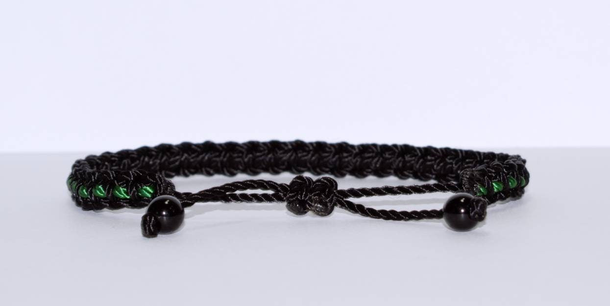 Black braided bracelet with a  green Line, adjustable wristband -new -handmade -for man & woman