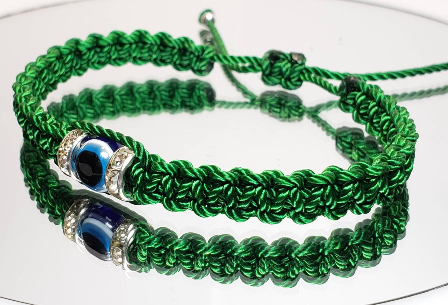 Evil eye amulet bracelet, emerald green string evil eye bracelet, evil eye wristband, evil eye protection, good luck charm, adjustable