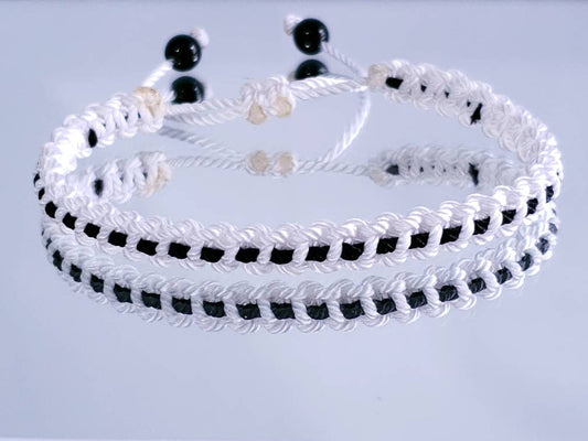 White with a black line bracelet -support wristband -braided -new -adjustable for man and woman