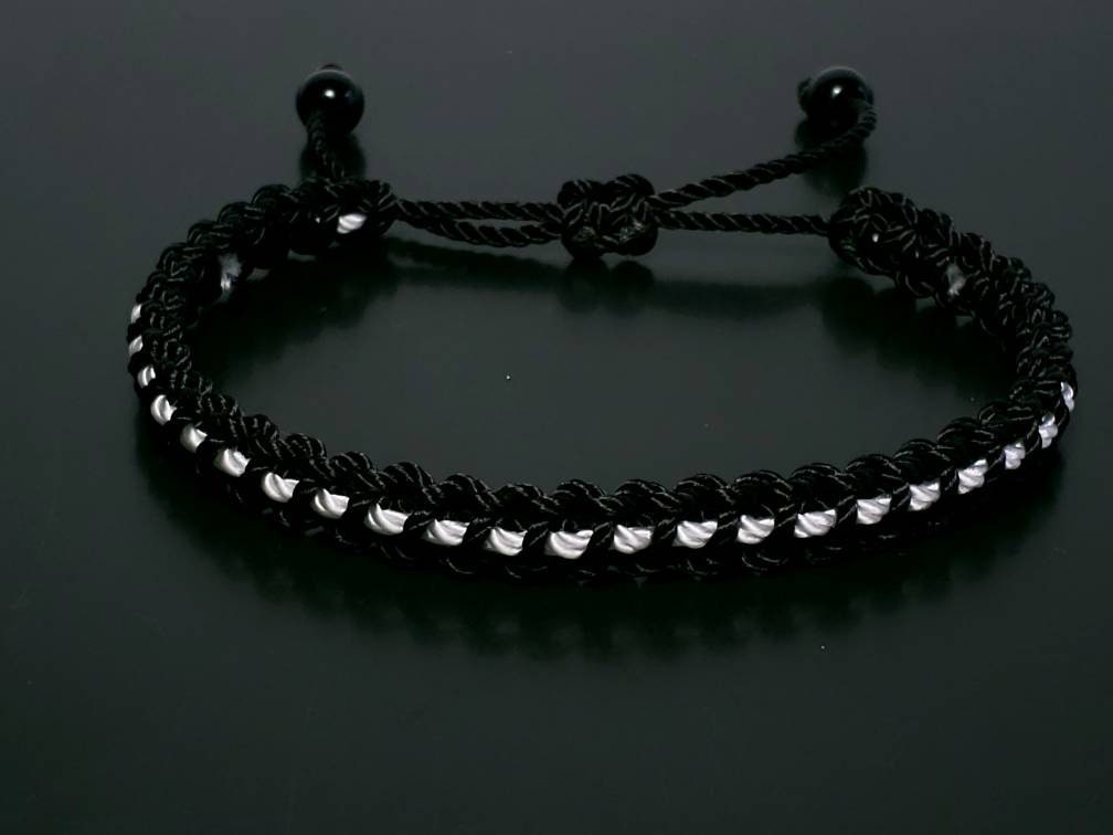 Black with a white line bracelet -support wristband -braided -new -adjustable for man and woman