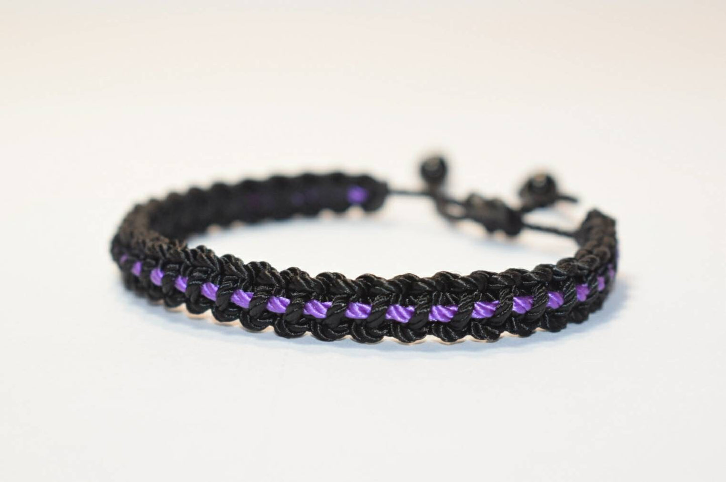 Thin purple line bracelet -Black braided bracelet with a purple Line, adjustable wristband -new- domestic violence awareness bracelet