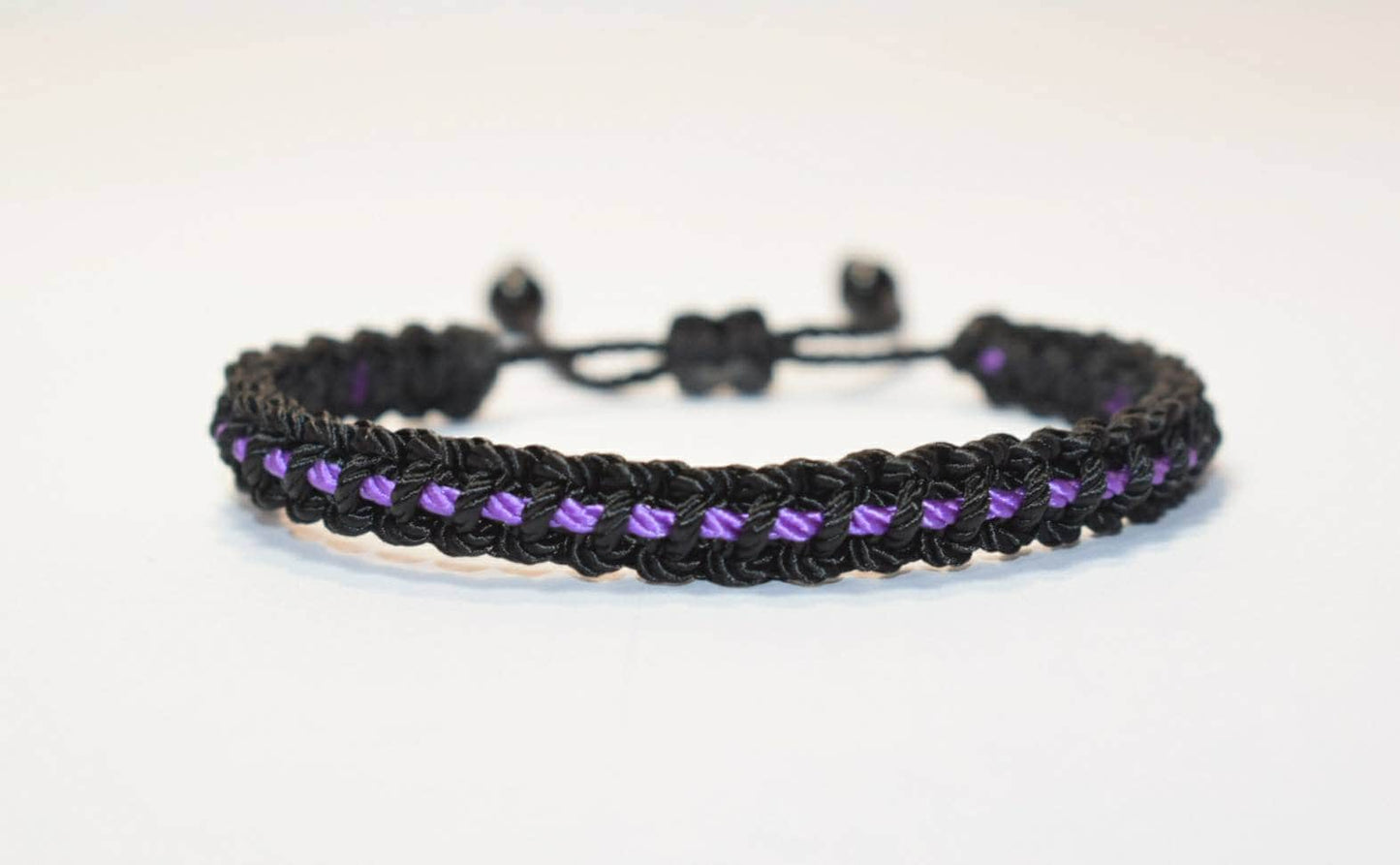 Thin purple line bracelet -Black braided bracelet with a purple Line, adjustable wristband -new- domestic violence awareness bracelet