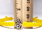 Lotus flower bracelet, yellow string braided bracelet, silver color lotus flower charm, new, adjustable for man & woman