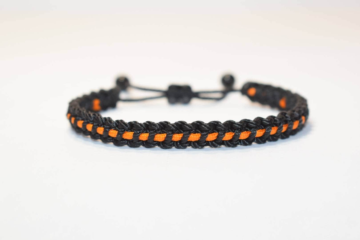 Black with orange line bracelet -Black braided bracelet with a  thin orange Line, adjustable wristband -new -handmade awareness  bracelet