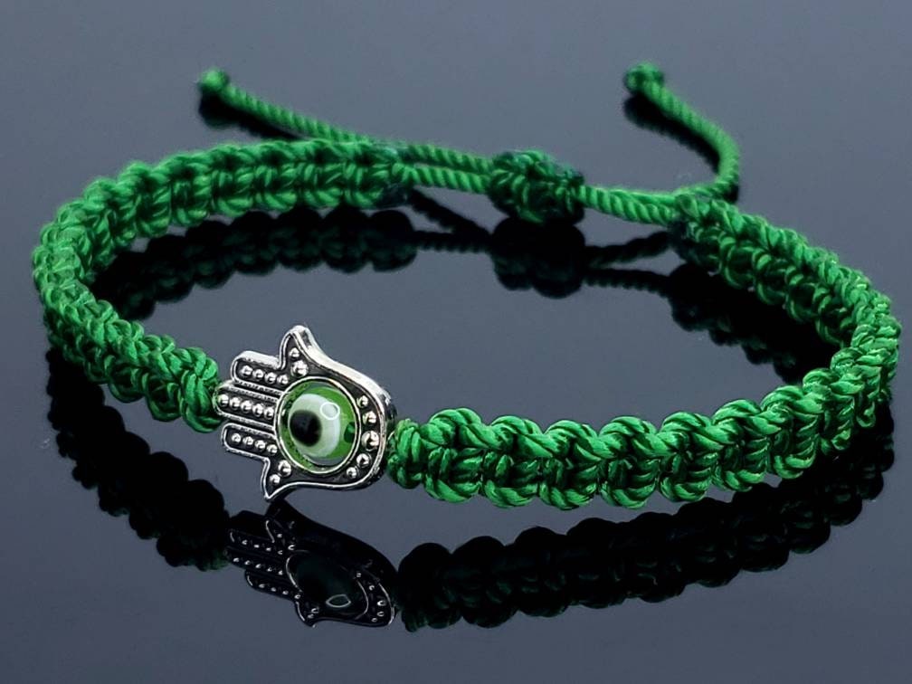 Hamsa Hand money bracelet with an evil eye for protection & good luck braided green string money wristband with a silver color hamsa hand