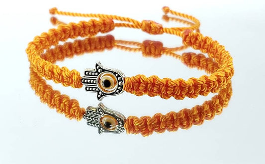 Hamsa Hand orange bracelet with an evil eye for protection and good luck, braided orange string wristband with a silver color hamsa hand