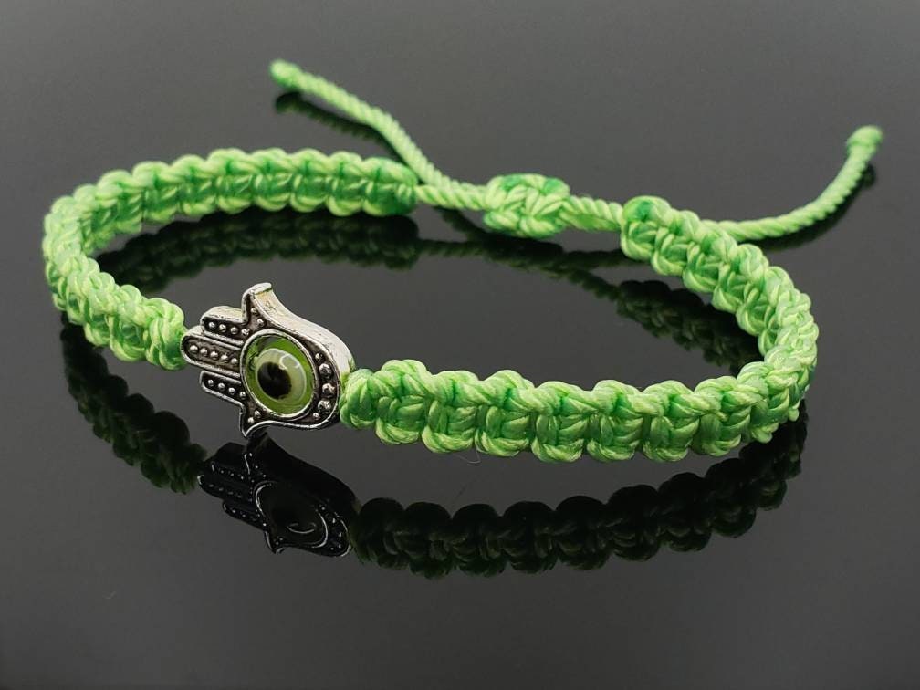 Hamsa Hand lime green bracelet with an evil eye for protection & good luck braided green string wristband with a silver color hamsa hand