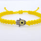 Hamsa Hand yellow bracelet with an evil eye for protection and good luck braided yellow string wristband with a silver color hamsa hand