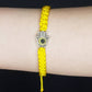 Hamsa Hand yellow bracelet with an evil eye for protection and good luck braided yellow string wristband with a silver color hamsa hand