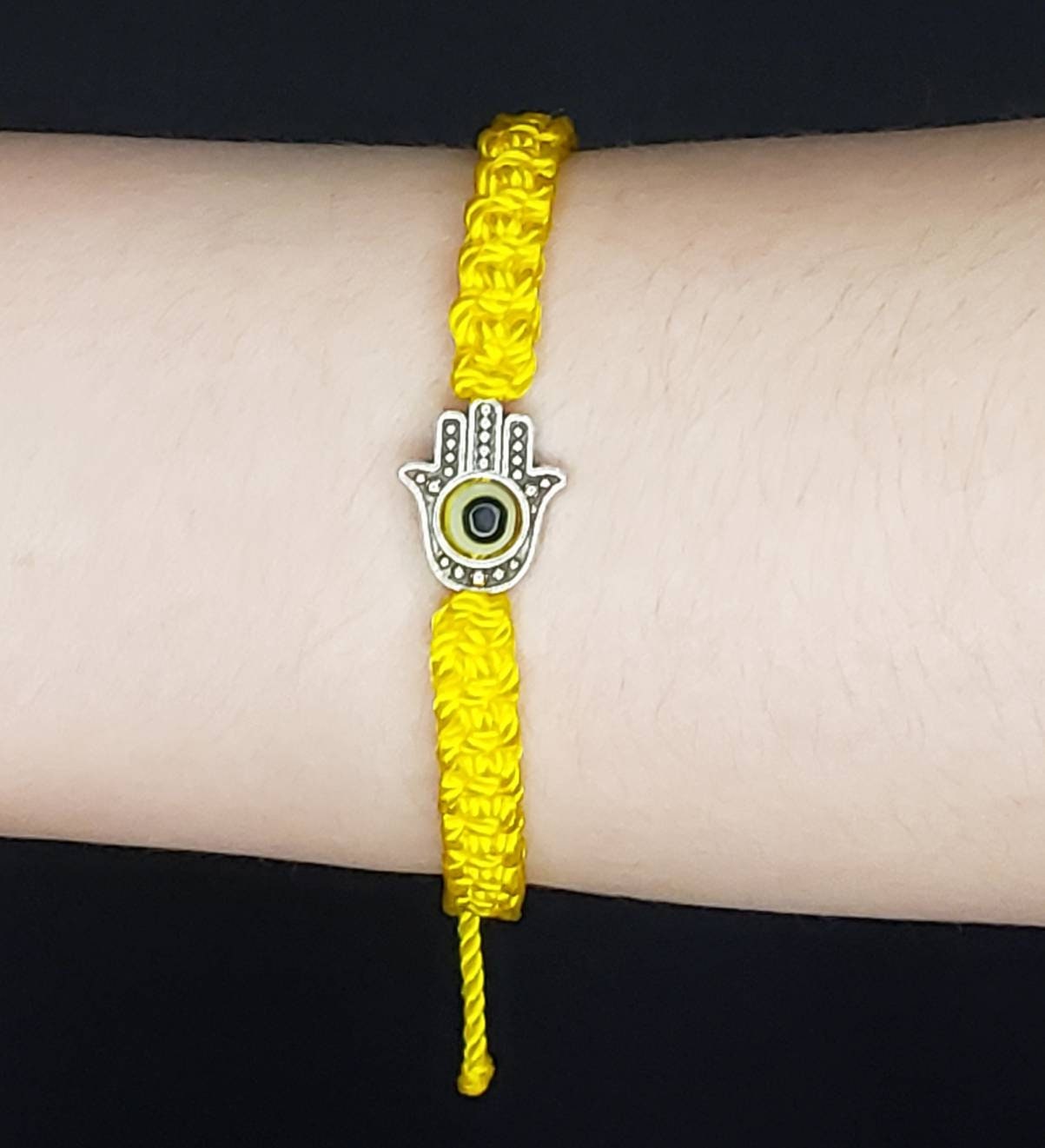 Hamsa Hand yellow bracelet with an evil eye for protection and good luck braided yellow string wristband with a silver color hamsa hand