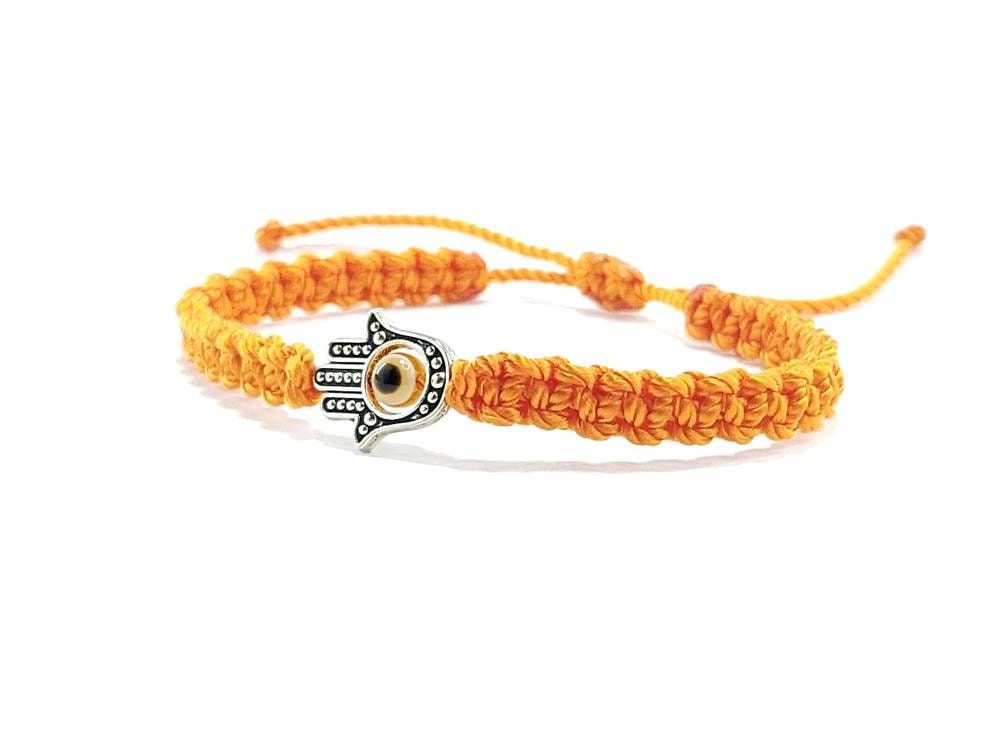 Hamsa Hand orange bracelet with an evil eye for protection and good luck, braided orange string wristband with a silver color hamsa hand