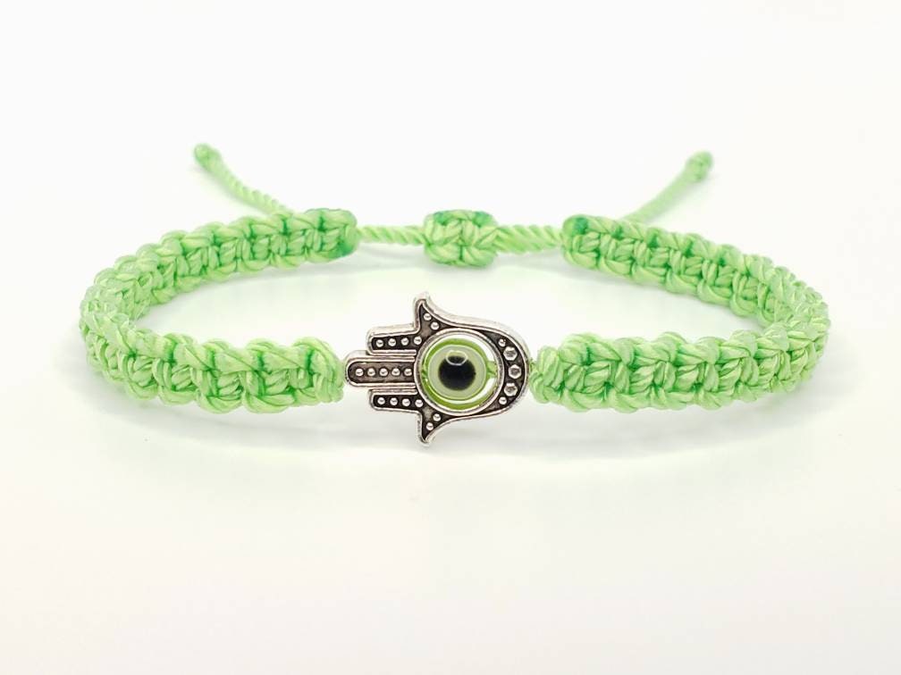 Hamsa Hand lime green bracelet with an evil eye for protection & good luck braided green string wristband with a silver color hamsa hand