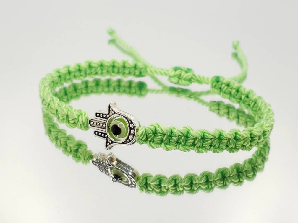 Hamsa Hand lime green bracelet with an evil eye for protection & good luck braided green string wristband with a silver color hamsa hand