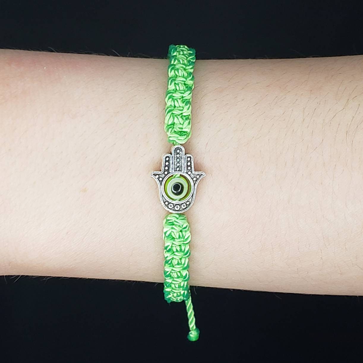 Hamsa Hand lime green bracelet with an evil eye for protection & good luck braided green string wristband with a silver color hamsa hand