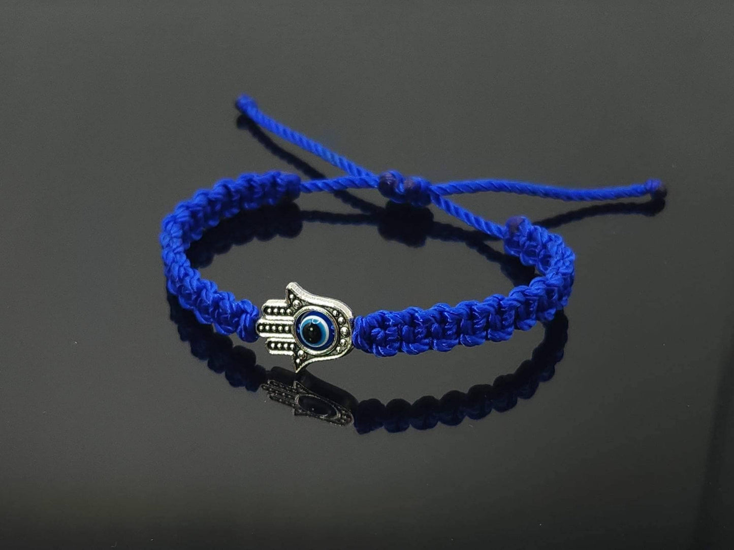 Kids size Hamsa hand royal blue string bracelet, for happiness, luck, health, and good fortune, good luck and evil eye protection for kids