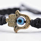 Hamsa hand bracelet with an evil eye for protection & good luck, braided black string wristband with a gold color hamsa hand adjustable