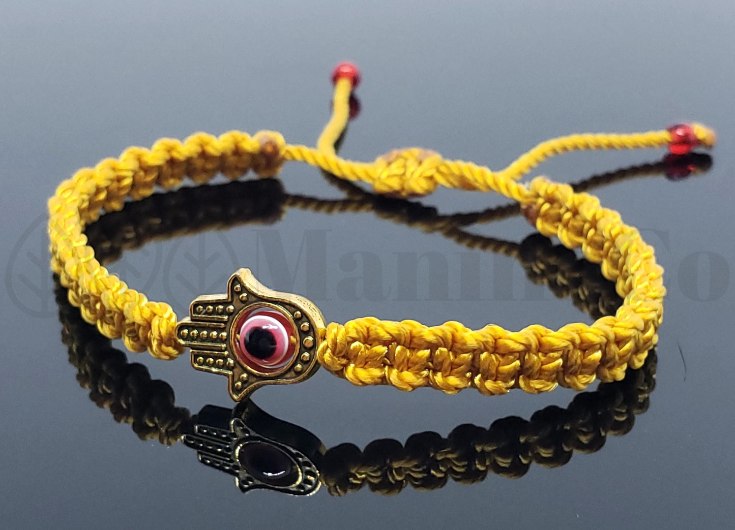 Hamsa Hand bracelet with an evil eye for protection and good luck, braided gold string wristband with a gold color hamsa hand, adjustable