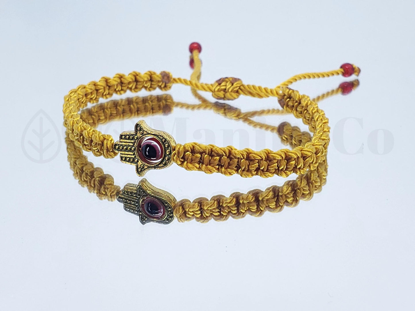 Hamsa Hand bracelet with an evil eye for protection and good luck, braided gold string wristband with a gold color hamsa hand, adjustable