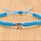 Elephant braided bracelet, turquoise blue string bracelet with an elephant charm for good luck, adjustable, for man and woman