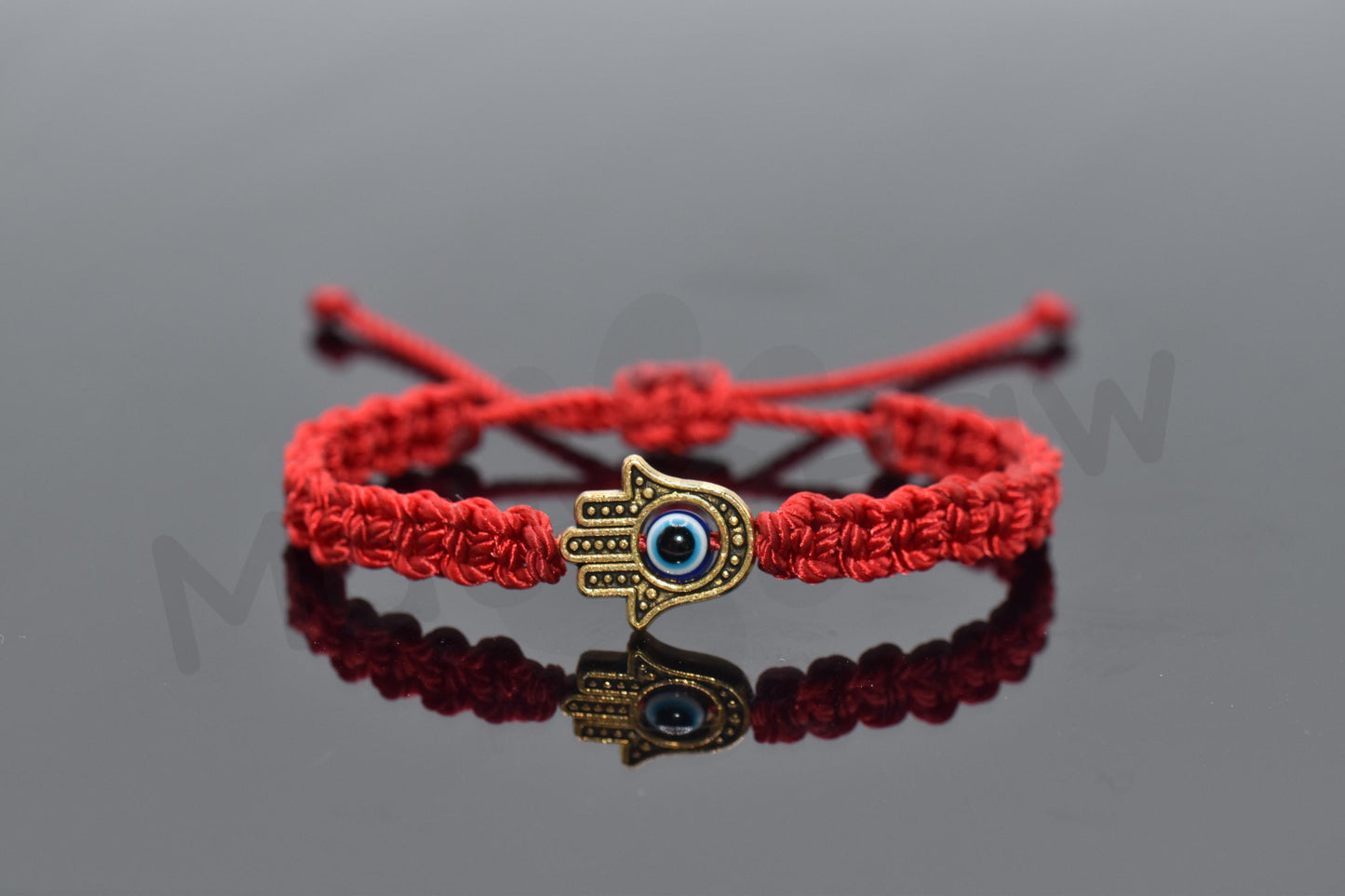 Kids size Hamsa Hand bracelet with an evil eye for protection & good luck braided red string evil eye with a gold color hamsa hand kids