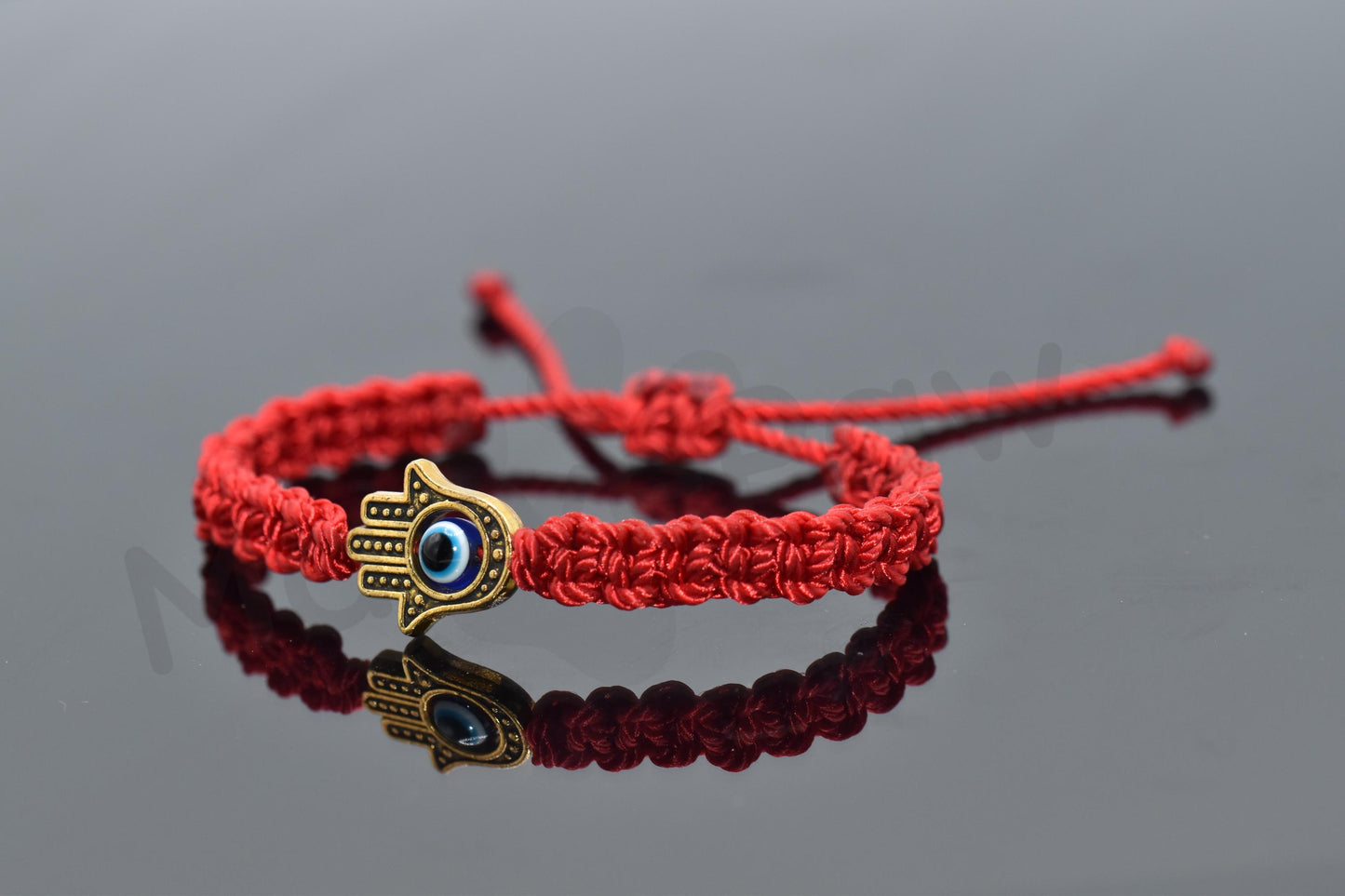 Kids size Hamsa Hand bracelet with an evil eye for protection & good luck braided red string evil eye with a gold color hamsa hand kids