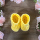 Yellow baby booties