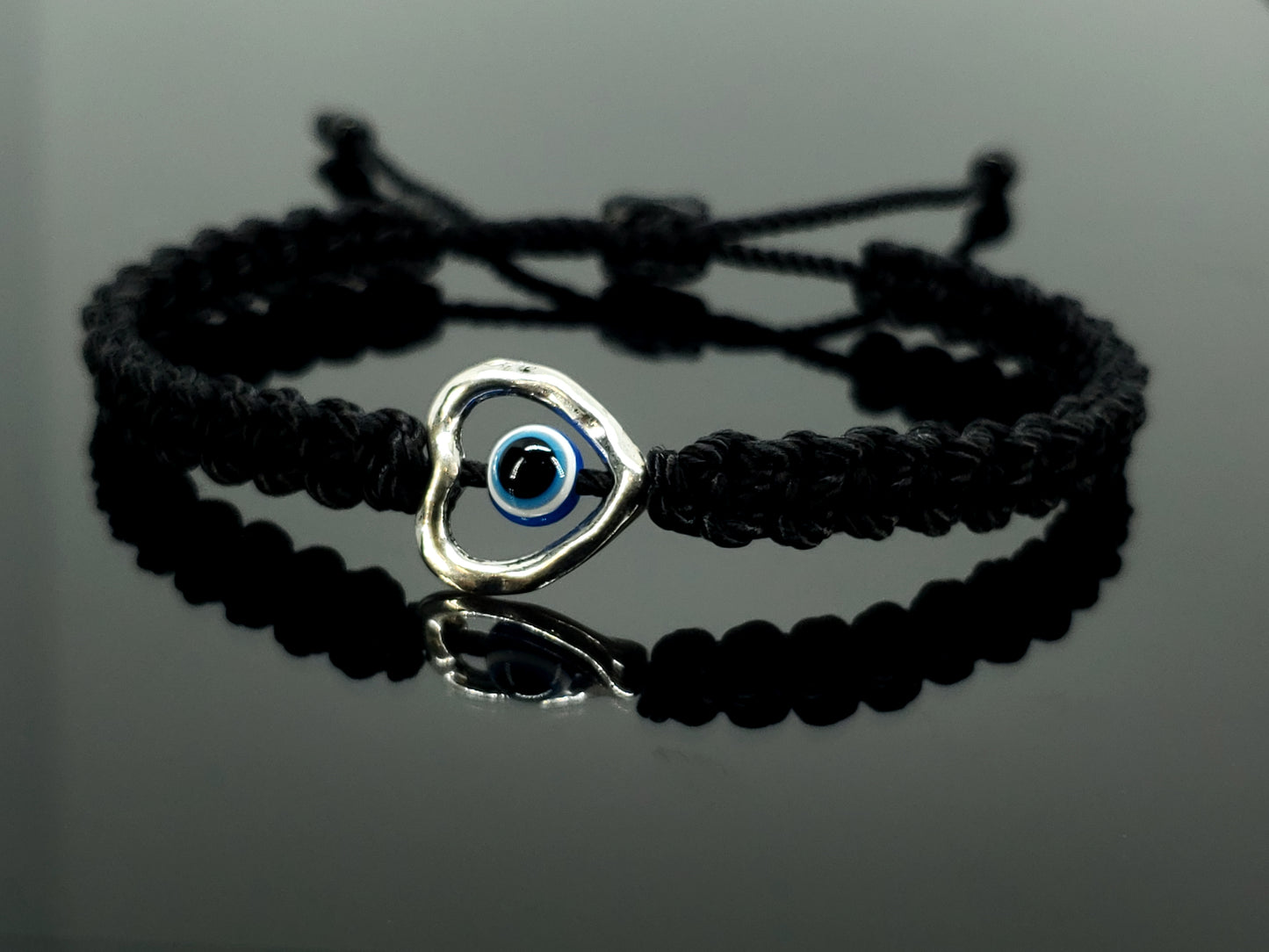 evil eye bracelet with metal heart, black -shc