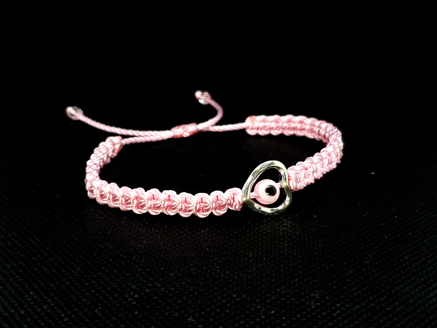 evil eye bracelet with silver tone metal heart, pink -shc