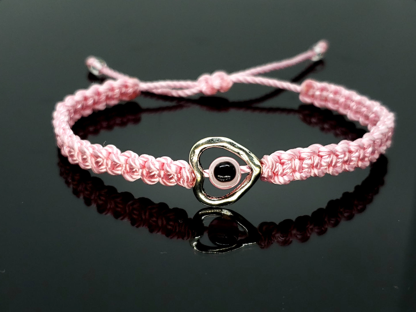 evil eye bracelet with silver tone metal heart, pink -shc